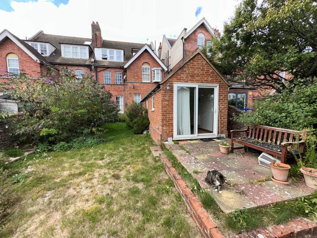 Lot: 74 - SUBSTANTIAL THREE-BEDROOM GARDEN FLAT FOR REFURBISHMENT - Back of property including garden